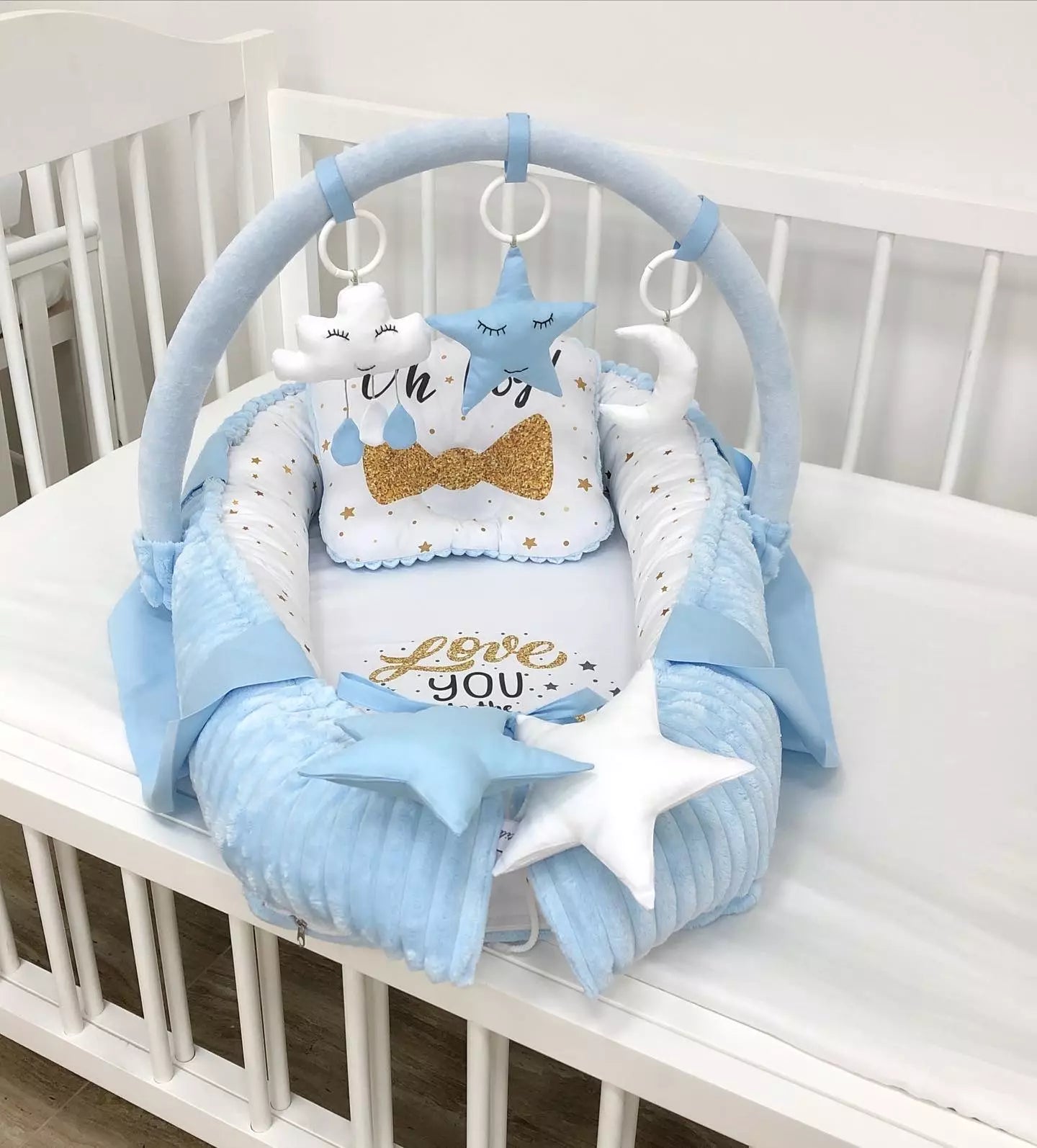 Baby nest with an arc and mini toys “Oh Boy” . - Baby Bedding Worlds