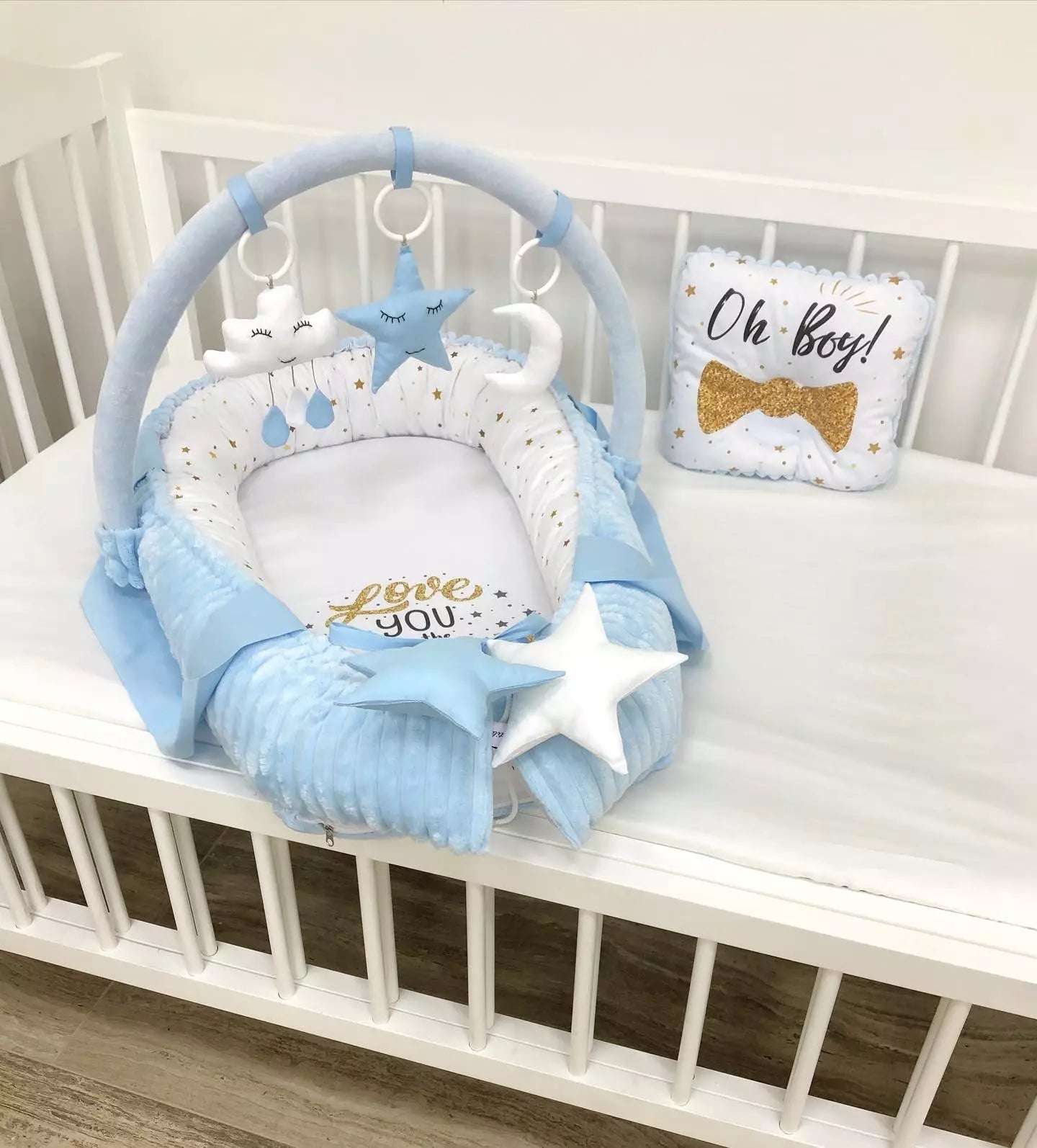 Baby nest with an arc and mini toys “Oh Boy” . - Baby Bedding Worlds