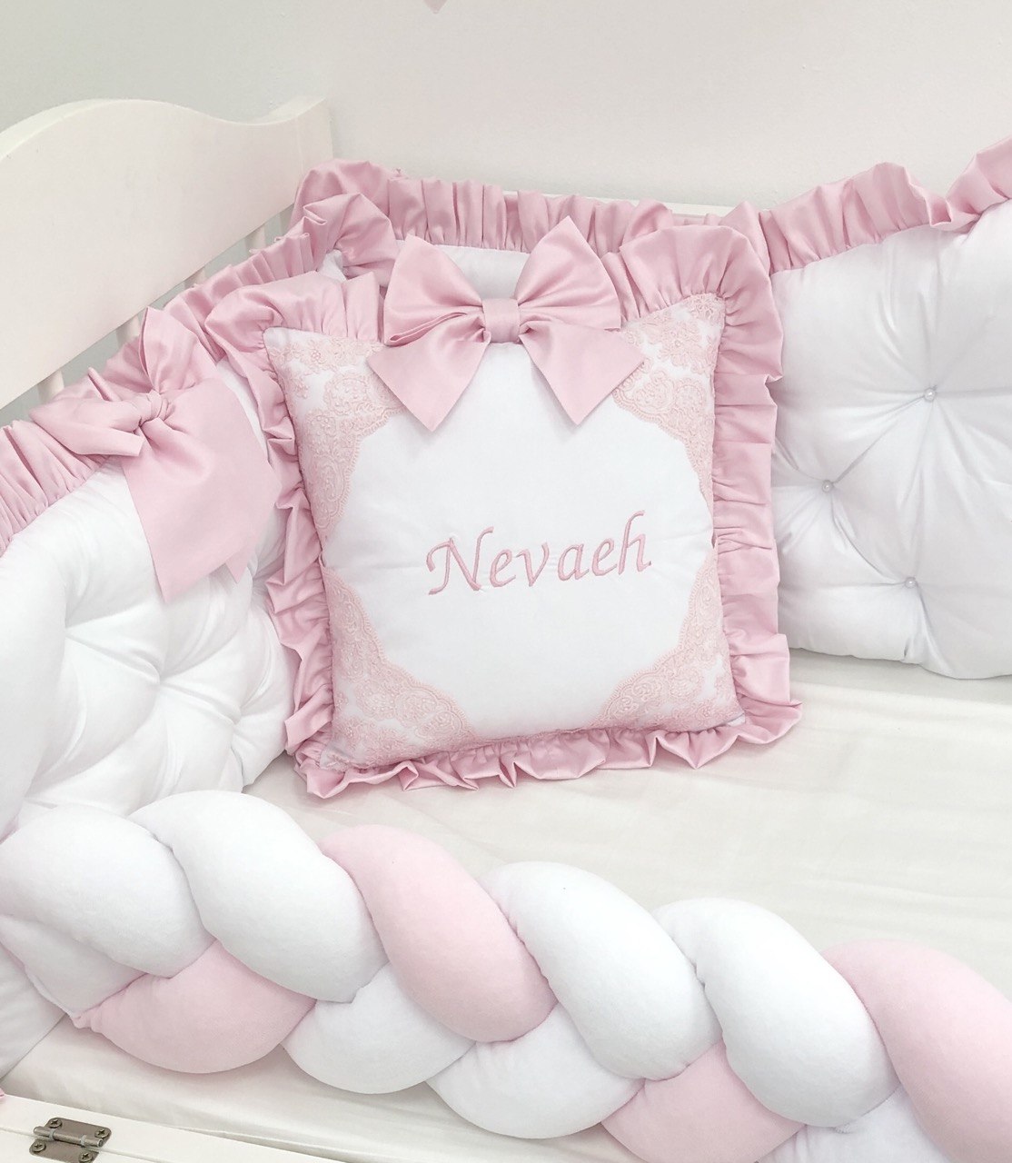 Decorative pillow with ruffle and embroidery with a bow. Personalized gift.